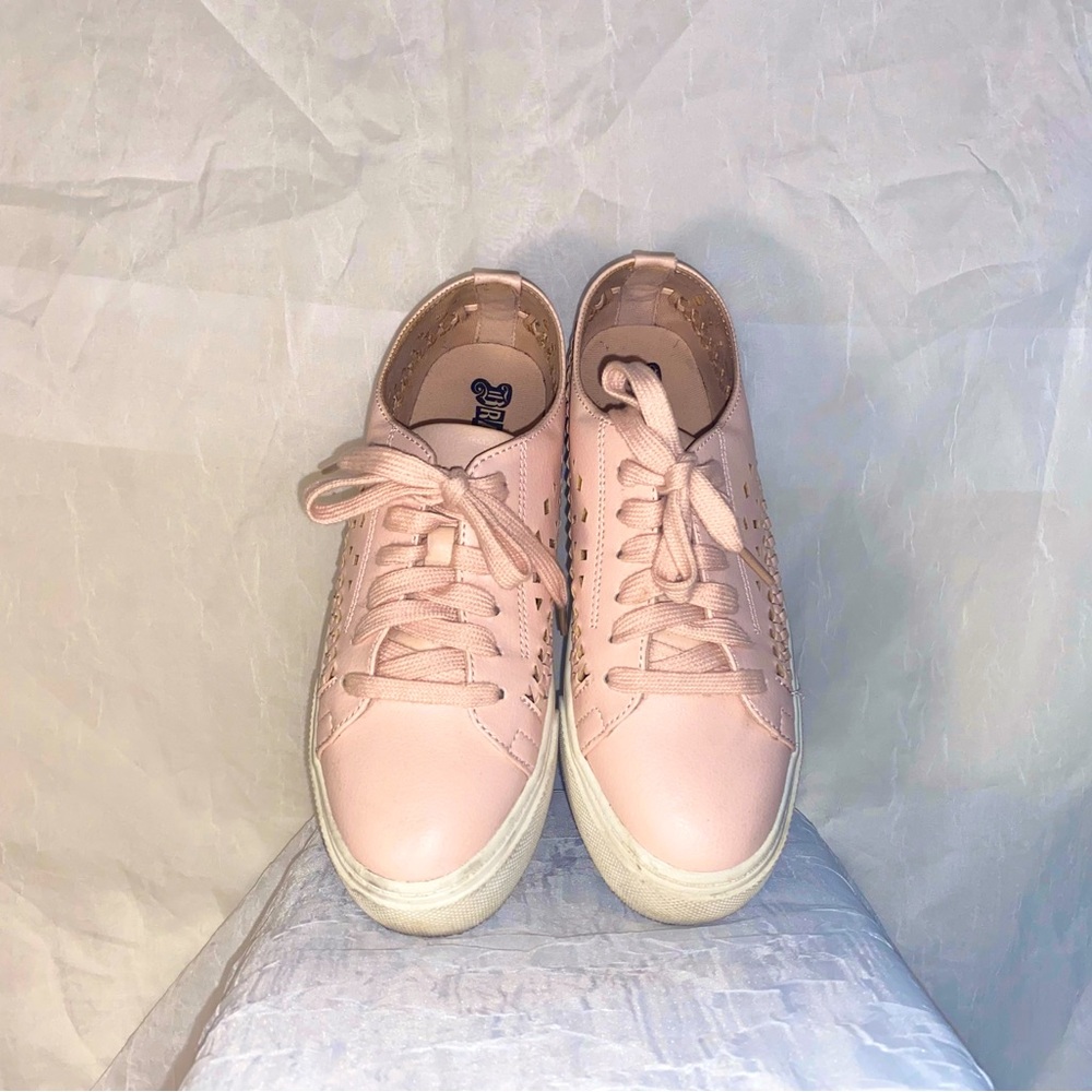 Peach and white decorated sneakers